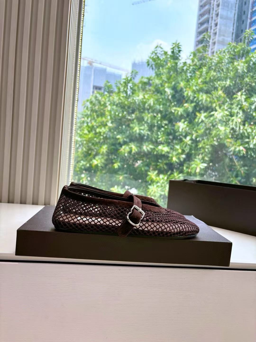 UA ALAÏA BALLET FLATS IN FISHNET