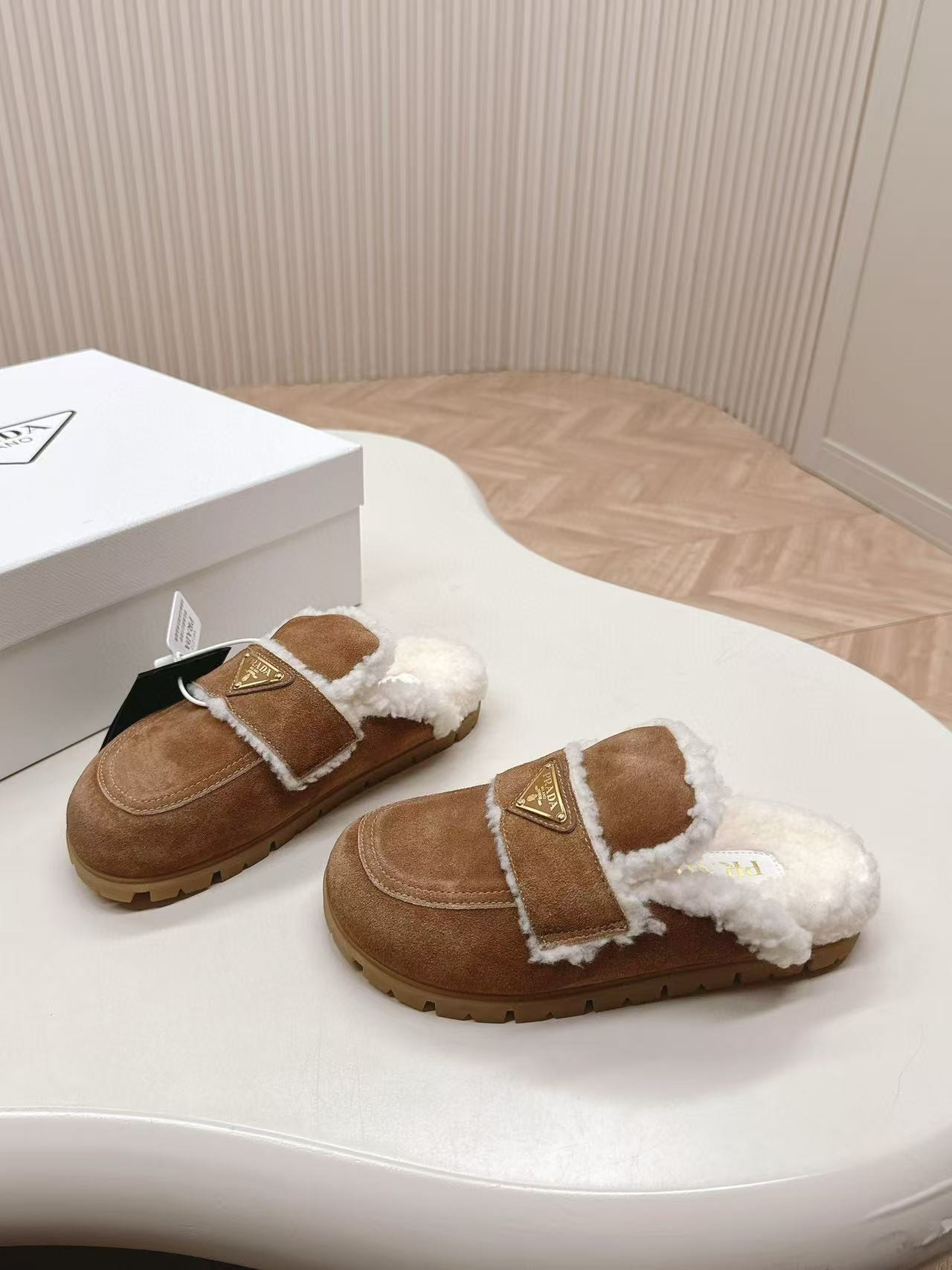 ua Pra*a suede slides