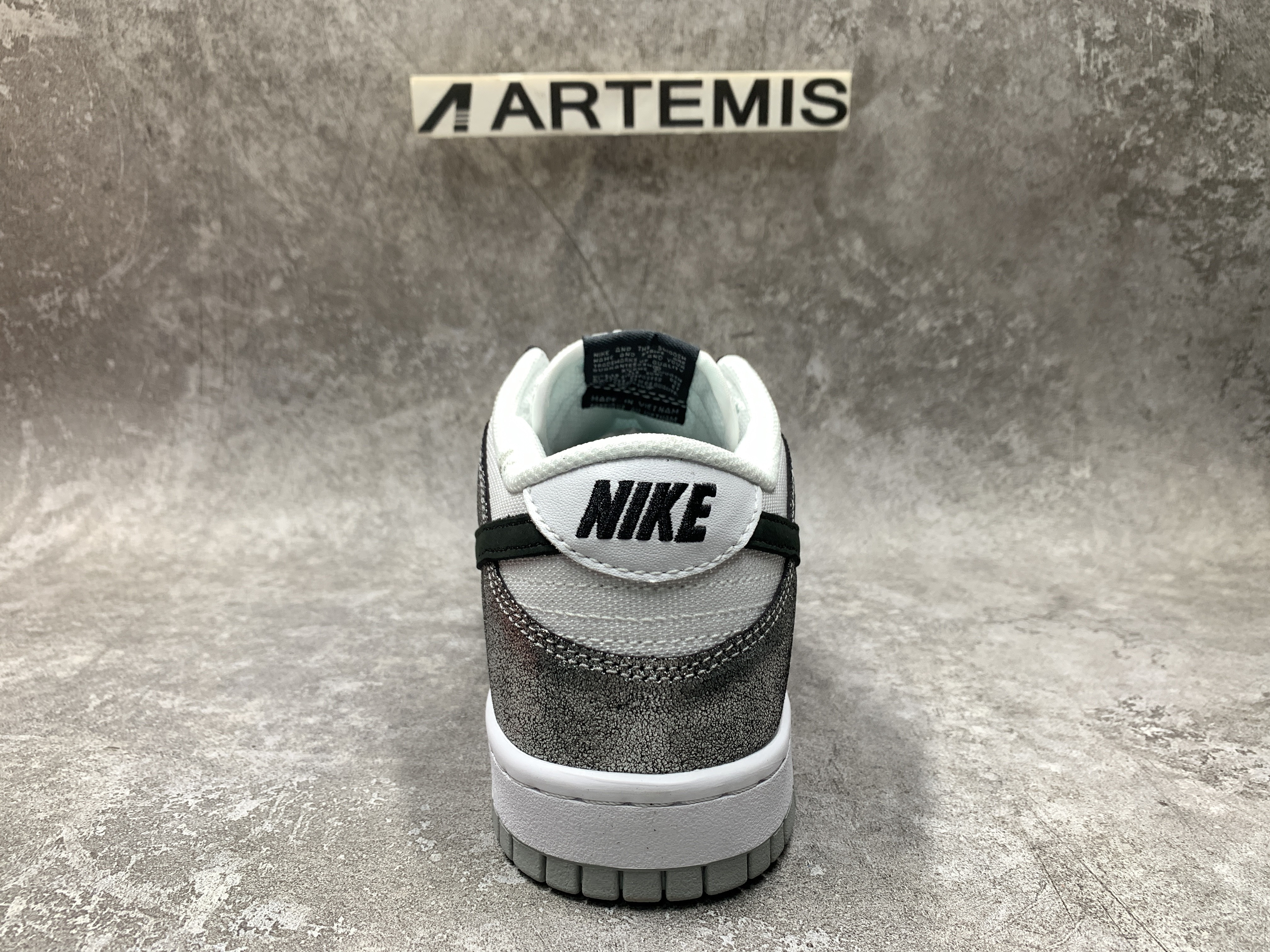 Nike Dunk Low Features Silver Cracked Leather