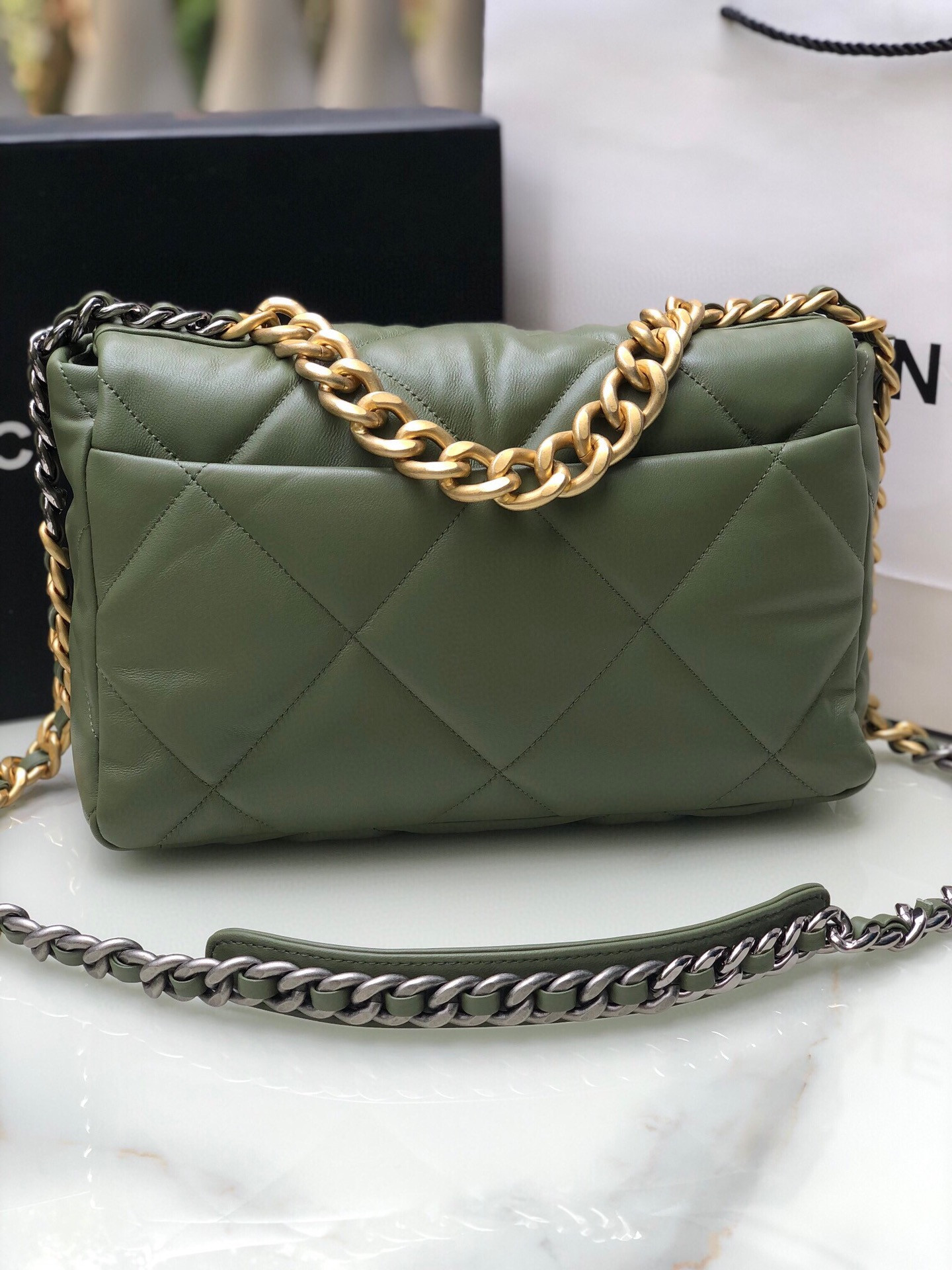 Ch*el 19 large handbag shiny leather, gold-tone, silver-tone & ruthenium-finish metal dark green 7.8 × 11.7 × 3.9 in