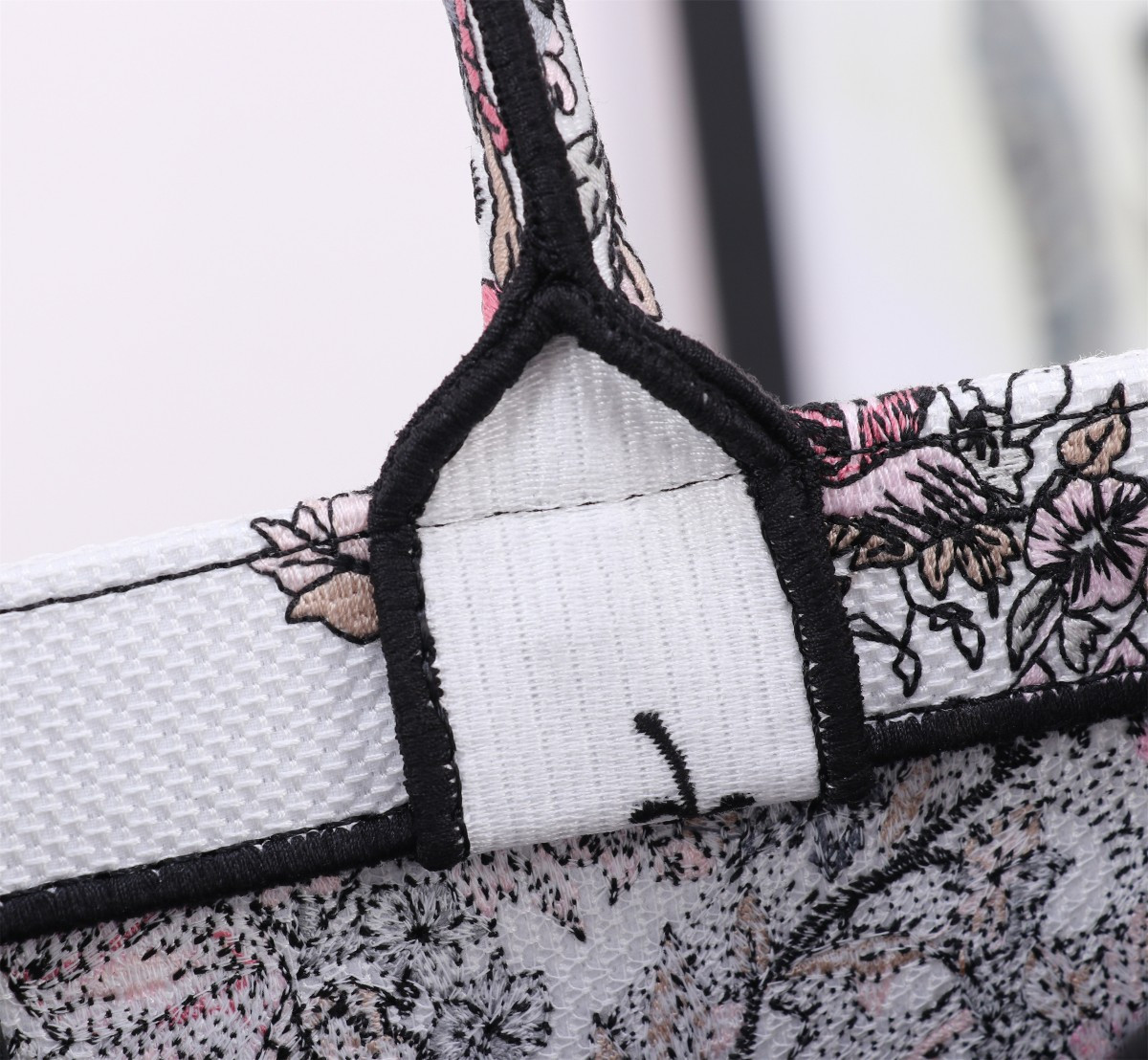 medium D*or book tote white and pastel pink butterfly around the world embroidery 14 x 11 x 6.5 inches