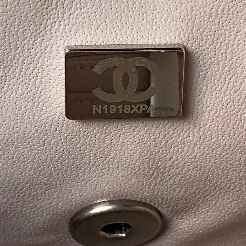 Ch*el mini flap bag shiny calfskin & silver-tone metal light pink 4.7 × 7.8 × 2.3 in